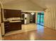 An open floor plan with an eat-in kitchen, stainless steel appliances, and sliding glass doors to the yard at 3920 Pigeon Creek Ln, Indianapolis, IN 46234