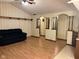 Spacious living room featuring laminate floors and an open floor plan at 3920 Pigeon Creek Ln, Indianapolis, IN 46234