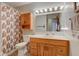 Traditional bathroom featuring a wood vanity, patterned shower curtain, and vanity lighting at 4464 Chatham Dr, Brownsburg, IN 46112