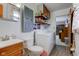 Laundry room with sink, cabinets, shelving and washer and dryer at 4464 Chatham Dr, Brownsburg, IN 46112