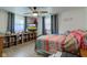 Inviting bedroom features a ceiling fan and a cozy atmosphere with natural light at 5014 Dawn St, Anderson, IN 46013