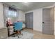 Modern bedroom features hardwood floors, natural light, and neutral-toned decor at 5014 Dawn St, Anderson, IN 46013