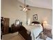 Comfortable bedroom with a ceiling fan and nice furniture set; neutral tones create a relaxing space at 5205 Mosswood Ct, Indianapolis, IN 46254