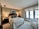 Serene bedroom featuring a comfortable bed, soft lighting, and a neutral color palette at 5205 Mosswood Ct, Indianapolis, IN 46254