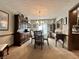 Formal dining room featuring elegant furniture, lighting, and classic decor at 5205 Mosswood Ct, Indianapolis, IN 46254