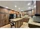 Spacious kitchen with stainless steel appliances, custom cabinets, and granite island at 5205 Mosswood Ct, Indianapolis, IN 46254