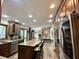 Modern kitchen featuring stainless steel appliances, granite countertops, and ample cabinet space at 5205 Mosswood Ct, Indianapolis, IN 46254
