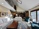 Spacious living room featuring a vaulted ceiling, skylight, and seamless flow into the kitchen at 5205 Mosswood Ct, Indianapolis, IN 46254