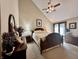 Cozy bedroom with high ceilings, natural light, and stylish furnishings at 5205 Mosswood Ct, Indianapolis, IN 46254