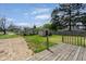 Expansive backyard with lush lawn, shed, and wooden deck perfect for outdoor entertaining at 5209 Melrose Ave, Indianapolis, IN 46241
