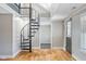 Unique living space with hardwood flooring, skylights and a spiral staircase at 5209 Melrose Ave, Indianapolis, IN 46241