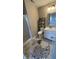 Updated bathroom featuring a stand-up shower, vanity, and decorative mirror at 5529 W Turnbuckle Pl, McCordsville, IN 46055