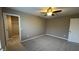 Neutral bedroom with a ceiling fan, carpet, and closet at 5529 W Turnbuckle Pl, McCordsville, IN 46055