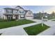 Attractive home exterior displaying mixed materials, professional landscaping, and a neatly maintained front yard at 5529 W Turnbuckle Pl, McCordsville, IN 46055