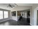 Open-concept living room with vaulted ceiling, providing easy access to the kitchen and dining area at 5529 W Turnbuckle Pl, McCordsville, IN 46055