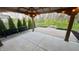 View from patio featuring patio stone and landscaped backyard at 5529 W Turnbuckle Pl, McCordsville, IN 46055