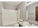 This bathroom features a shower-tub combination and a large mirror above the vanity at 5666 Ensley Ct, Indianapolis, IN 46254