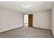 Bedroom featuring a gray carpet and neutral walls at 5666 Ensley Ct, Indianapolis, IN 46254