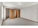Spacious bedroom with soft carpet, ample closet space, and neutral paint at 5666 Ensley Ct, Indianapolis, IN 46254