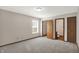 Bedroom features carpet, a window, and has easy access to an ensuite bathroom at 5666 Ensley Ct, Indianapolis, IN 46254