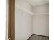 Walk in closet with closet rods and carpet at 5666 Ensley Ct, Indianapolis, IN 46254