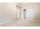 Bedroom with neutral carpet, and a closet with mirrored doors at 5845 Arrowleaf Ln, Carmel, IN 46033