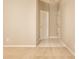 Bedroom featuring neutral carpet, trim, and two entrance doors at 5845 Arrowleaf Ln, Carmel, IN 46033