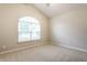 Bedroom featuring tall ceilings and carpeted floor at 5845 Arrowleaf Ln, Carmel, IN 46033