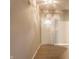 Bright entryway with wood floors, a classic white door, and neutral walls creating a welcoming ambiance at 5845 Arrowleaf Ln, Carmel, IN 46033