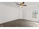 Bedroom with a window and neutral carpet at 5924 Skyward Ln, Indianapolis, IN 46234