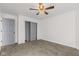 Bedroom with a ceiling fan, closet, and neutral carpet at 5924 Skyward Ln, Indianapolis, IN 46234