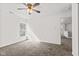 Bedroom with a ceiling fan, carpet, and a window at 5924 Skyward Ln, Indianapolis, IN 46234