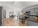 Functional kitchen with stainless steel appliances, adjacent dining area, and sliding door to backyard at 5924 Skyward Ln, Indianapolis, IN 46234