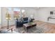 Inviting living room filled with natural light and contemporary decor with a view of the neighborhood at 5924 Skyward Ln, Indianapolis, IN 46234