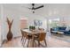 Open-concept living and dining area is filled with natural light and is perfect for entertaining at 5924 Skyward Ln, Indianapolis, IN 46234