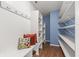 Mud room with ample storage, bench and colorful pillows at 5924 Skyward Ln, Indianapolis, IN 46234