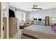 The bedroom features a bed with a window and gray walls at 5937 Terrytown Pkwy, Indianapolis, IN 46254