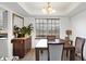 Bright dining area features a buffet table, a large window, and room to entertain at 5937 Terrytown Pkwy, Indianapolis, IN 46254