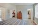 Bedroom featuring a walk-in closet and an ensuite bathroom at 620 Pomeroy St, Indianapolis, IN 46202