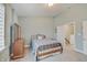 Tranquil bedroom with neutral tones, a large bed, and a bright window at 620 Pomeroy St, Indianapolis, IN 46202