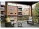 Cozy patio with outdoor seating and string lights, perfect for relaxing and entertaining at 620 Pomeroy St, Indianapolis, IN 46202