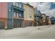 Stylish townhomes with individual garage and balconies, showcasing modern design and curb appeal at 620 Pomeroy St, Indianapolis, IN 46202