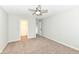 Room with neutral walls, carpeting, and a ceiling fan offers comfort and style on the second floor at 6507 Tram Ct, Indianapolis, IN 46260