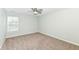 Cozy room features neutral walls, carpeting, and a ceiling fan, offering a relaxing retreat on the second floor at 6507 Tram Ct, Indianapolis, IN 46260