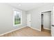 Bright bedroom featuring a large window and closet at 6507 Tram Ct, Indianapolis, IN 46260