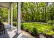 Scenic view of backyard showing lush greenery and a glimpse of the property's fence at 654 E 79Th St, Indianapolis, IN 46240