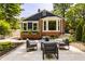 Backyard patio with modern outdoor furniture that create an ideal space for social gatherings at 654 E 79Th St, Indianapolis, IN 46240