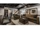 A finished basement with an office nook and a comfortable lounge area at 654 E 79Th St, Indianapolis, IN 46240
