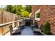 Outdoor deck with a grill and outdoor seating furniture perfect for entertaining Gathering and friends at 654 E 79Th St, Indianapolis, IN 46240