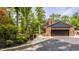 Charming home with a well-manicured yard, beautiful landscaping, and inviting curb appeal at 654 E 79Th St, Indianapolis, IN 46240